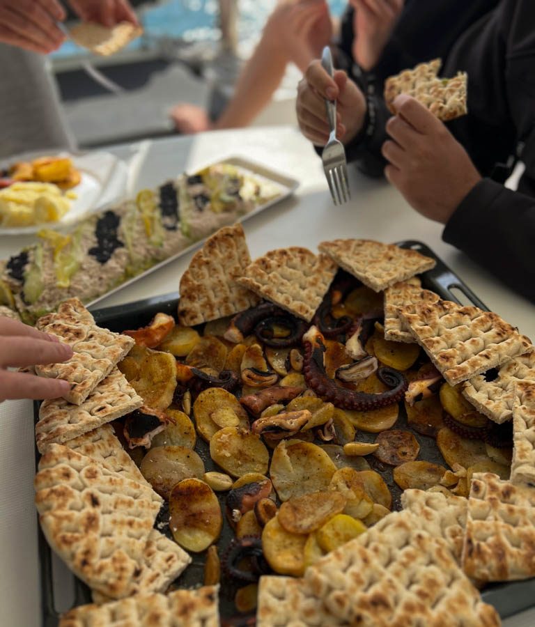 Biscuits and octopus snack on the boat